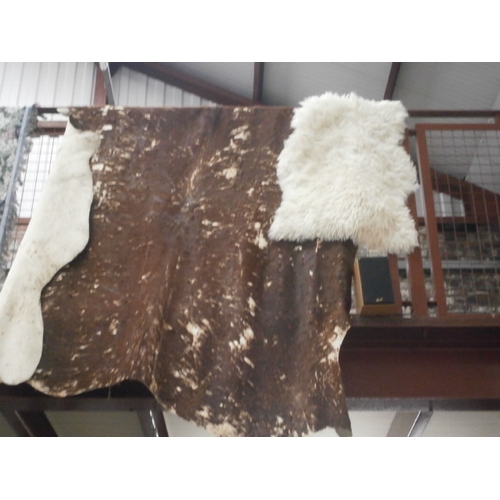180 - Sheepskin rug and animal hide