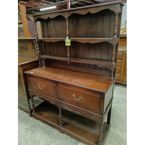 680 - A large vintage 2 drawer oak dresser with turned supports