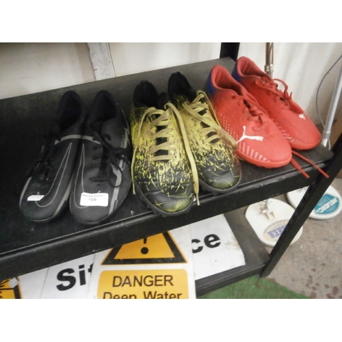 109 - Three pairs of football boots