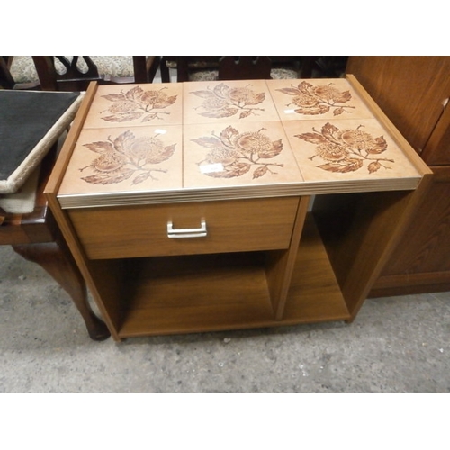 626 - A tile topped tea trolley table with drawer