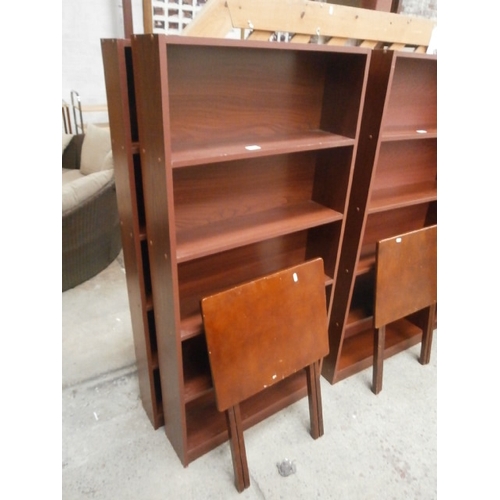 704 - A pair of open shelf units and a small folding table