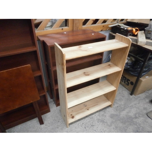 706 - A pair of small open shelf units and a pine shelf stand