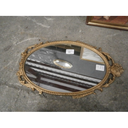 269 - Small ornate gilt framed mirror