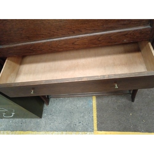 638 - A large vintage solid oak fall front bureau with lower drawer and lift front cupboard