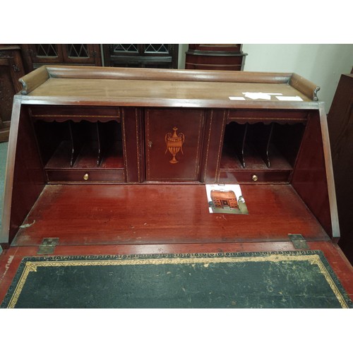 678 - A small vintage inlaid mahogany 7 drawer bureau with fitted interior