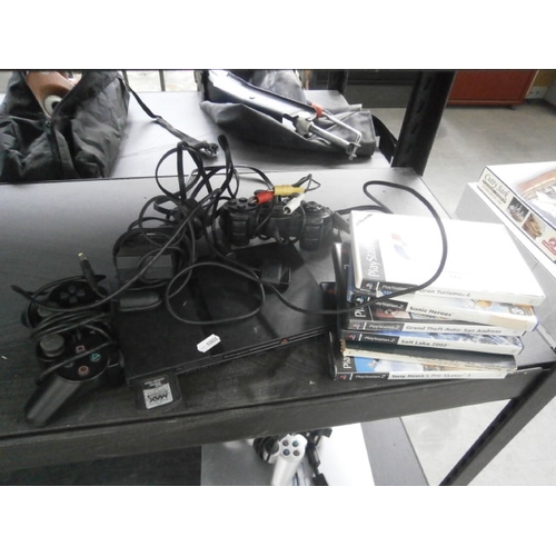 123 - Slim PS2 with controllers and games