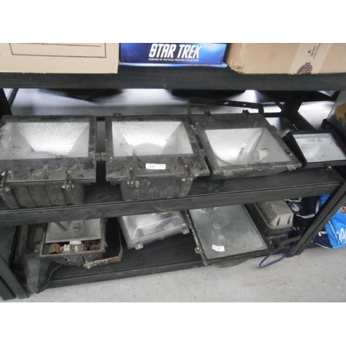 139 - Four assorted floodlights