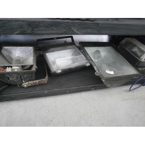 140 - Four assorted floodlights