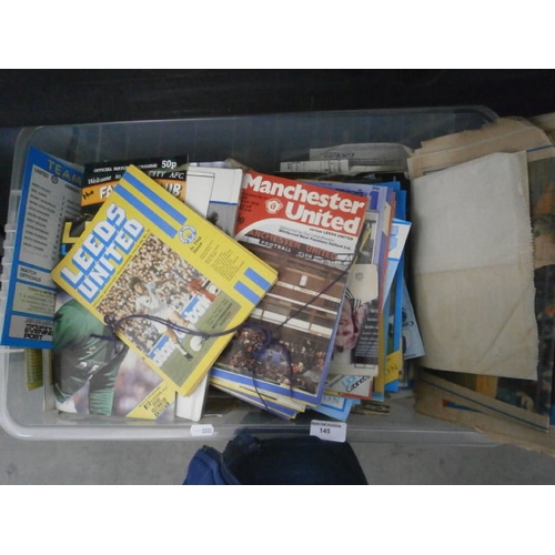 145 - Box of assorted old football programmes and papers, mostly Leeds united