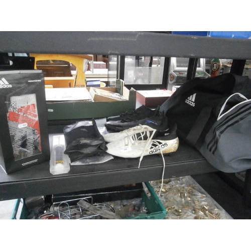 149 - Adidas items inc holdall, football boots, shin pads, goalkeeper gloves, football pump