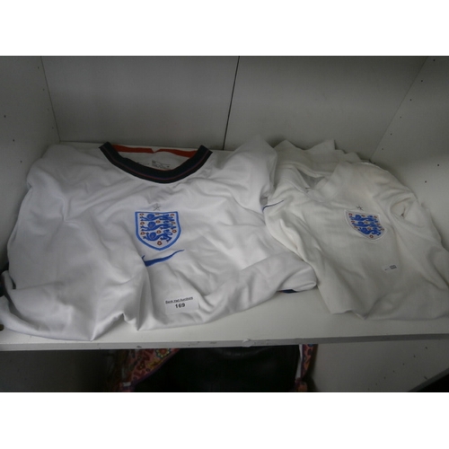 169 - Two England shirts