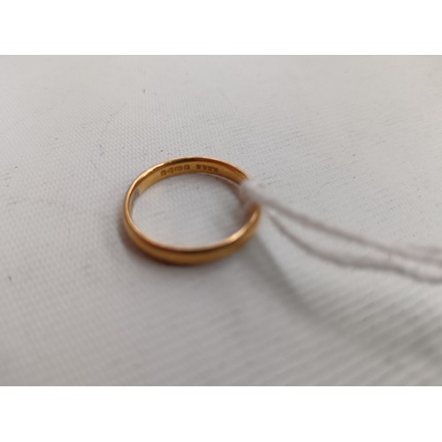 233 - 22ct gold hallmarked wedding band, weight 3.5 grams