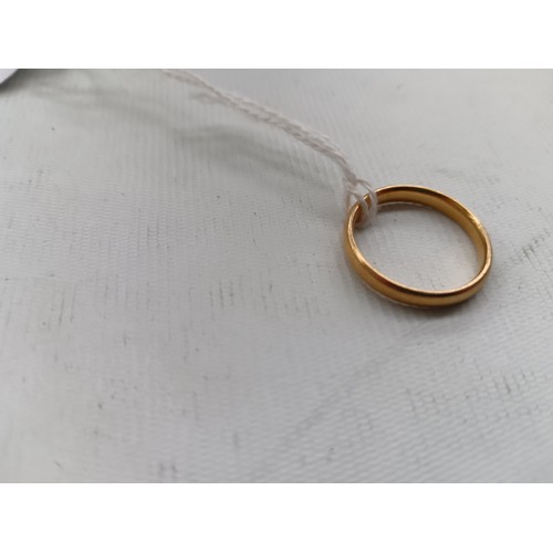 233 - 22ct gold hallmarked wedding band, weight 3.5 grams