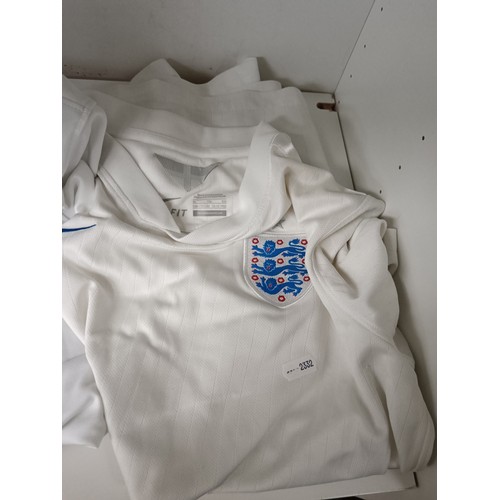 169 - Two England shirts