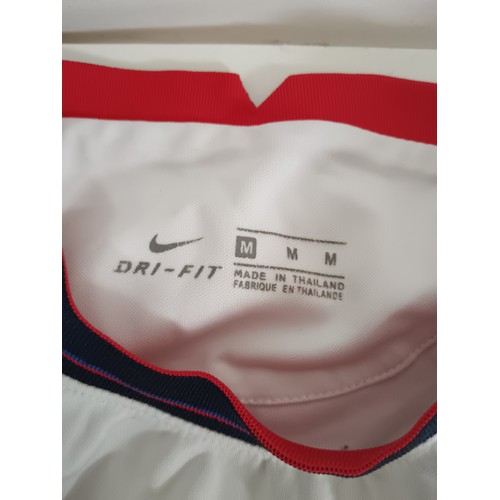 169 - Two England shirts