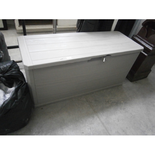 602 - A large plastic garden storage box - broken catch