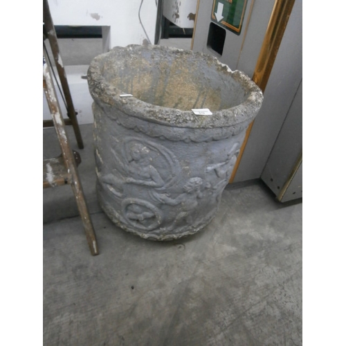 619 - A modern standard lamp and a cast stone garden pot