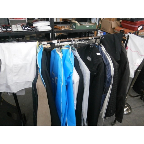 621 - A rail of assorted clothing - rail not included