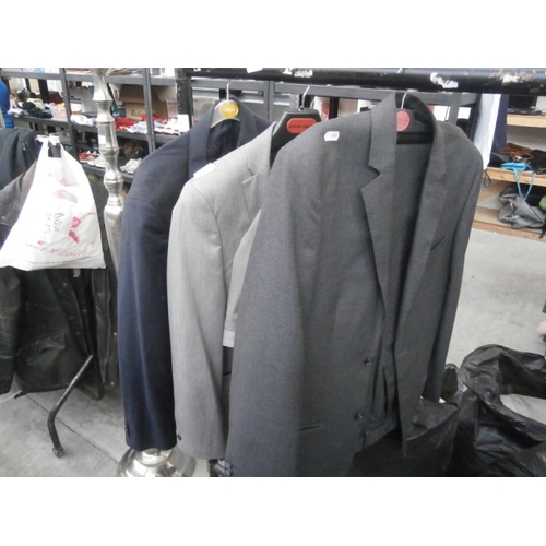 623 - 2 x gents' suits and a jacket