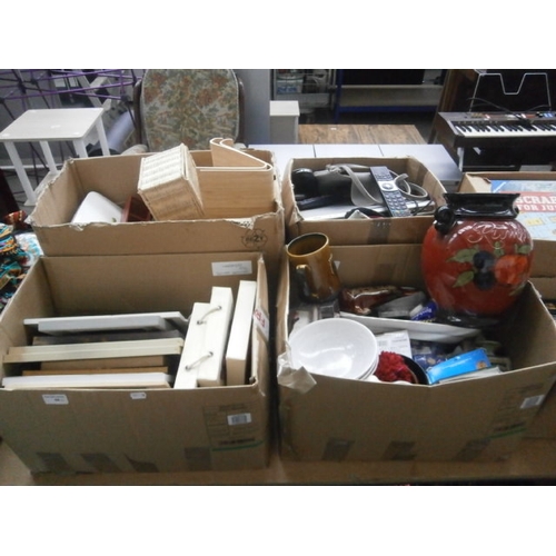 66 - Four boxes inc picture frames, shot trays, DVD player, purses, ornaments, etc