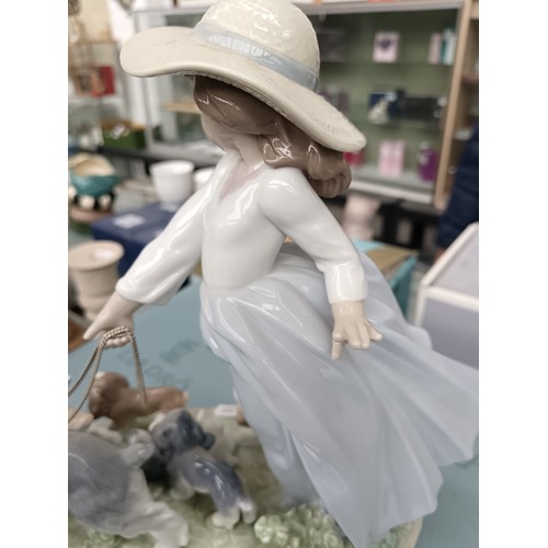 160 - LLADRO girl walking dogs ornament