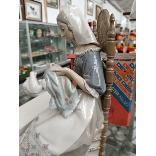 189 - LLADRO lady sewing figurine