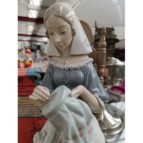 189 - LLADRO lady sewing figurine