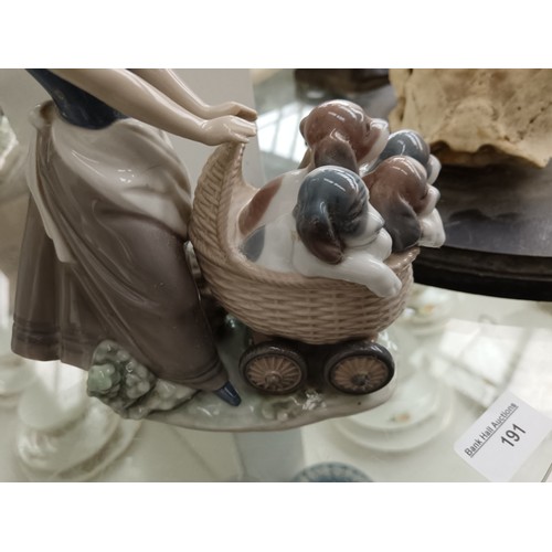 191 - LLADRO girl pushing basket of dogs ornament