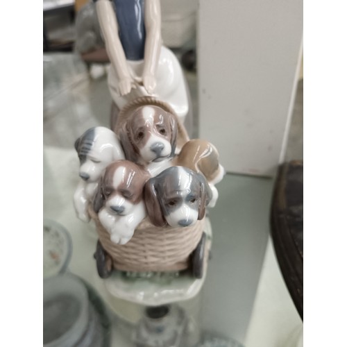 191 - LLADRO girl pushing basket of dogs ornament