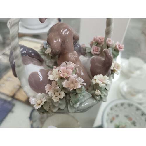 193 - LLADRO basket and three dogs ornament