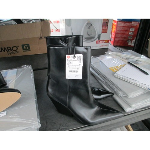 254 - Box of new Zara items inc boots, knee boots, coat, shirts, dress. Value of items £296