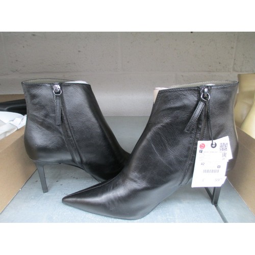 292 - Box of new Zara items inc two pairs of boots, pants and top, value of items £170