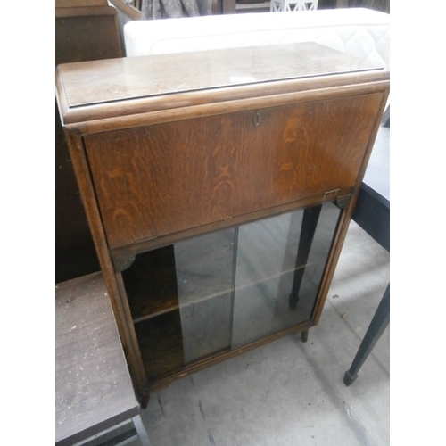 639 - A small vintage oak fall front bureau bookcase with lower glass sliding doors