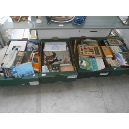 344 - Four boxes of assorted books