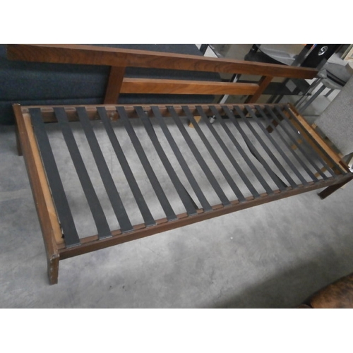 622 - A large wooden sofa bench frame - no cushions