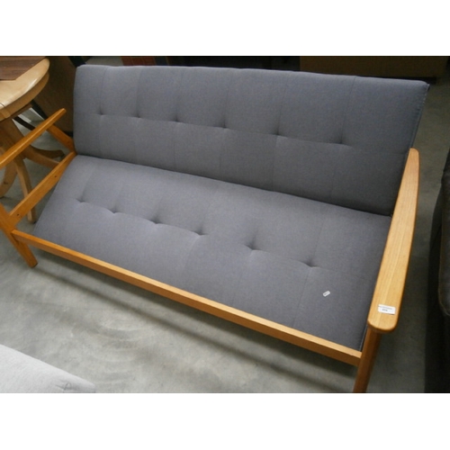 634 - A folding wood framed bed settee