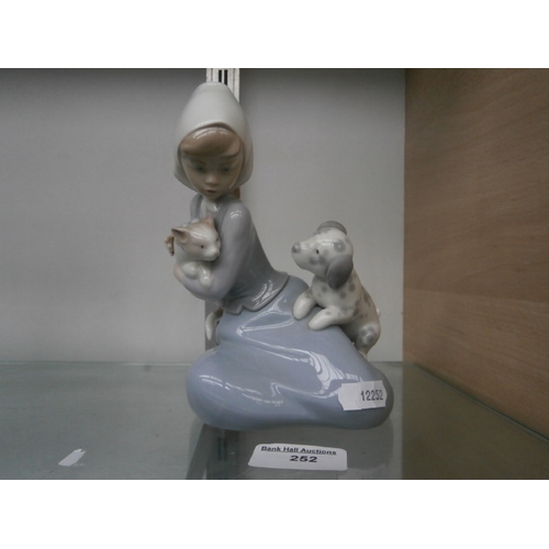 252 - LLADRO girl with kitten and puppy figurine