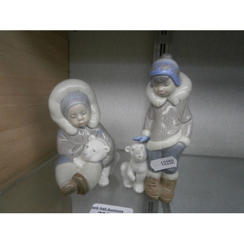 280 - Two LLADRO Inuit people figurines