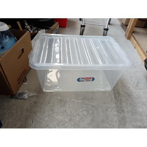 10 - Eight plastic storage boxes 7 with lids