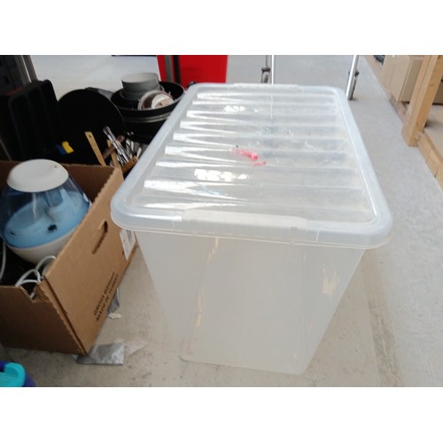 10 - Eight plastic storage boxes 7 with lids