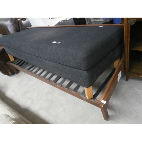 624 - A long upholstered bench seat and a wooden sofa frame