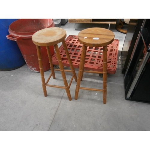 641 - A pair of tall vintage wooden bar stools