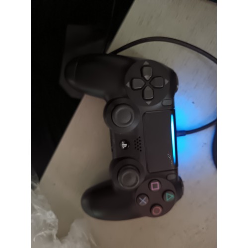 170 - PS4 with controllers and power lead, working and cleaned