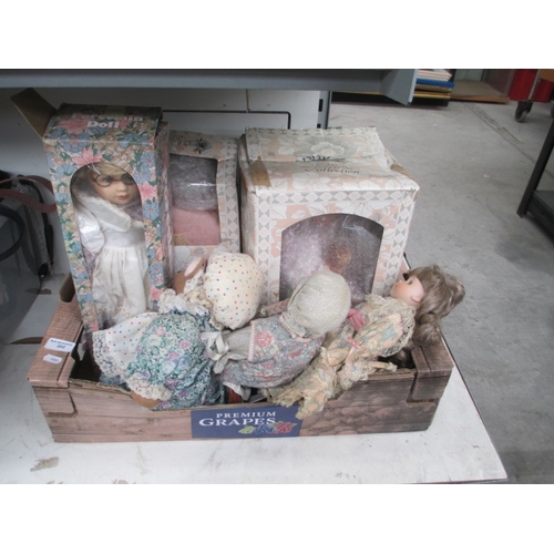 202 - Five assorted porcelain dolls and soft toy