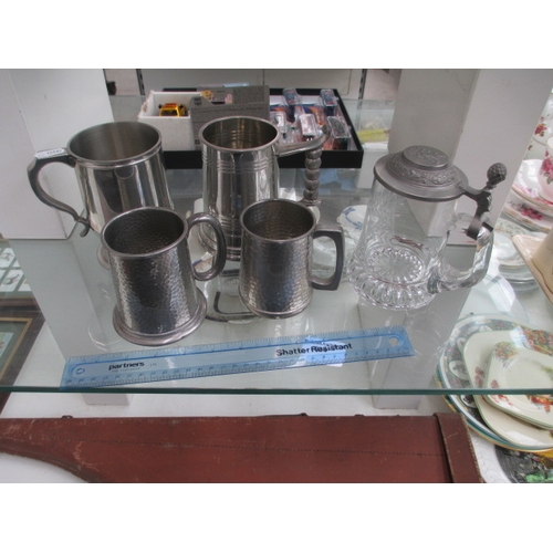 234 - Five assorted tankards