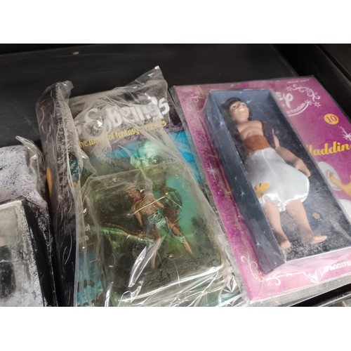 161 - Eight superhero comic magazines with figurines and Disney magazine with figure, Two magazine shave w... 