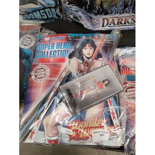 161 - Eight superhero comic magazines with figurines and Disney magazine with figure, Two magazine shave w... 