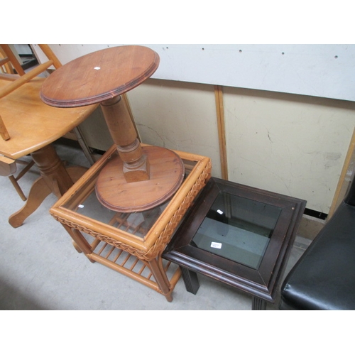 670 - A vintage pine pedestal and 2 x small glass top tables