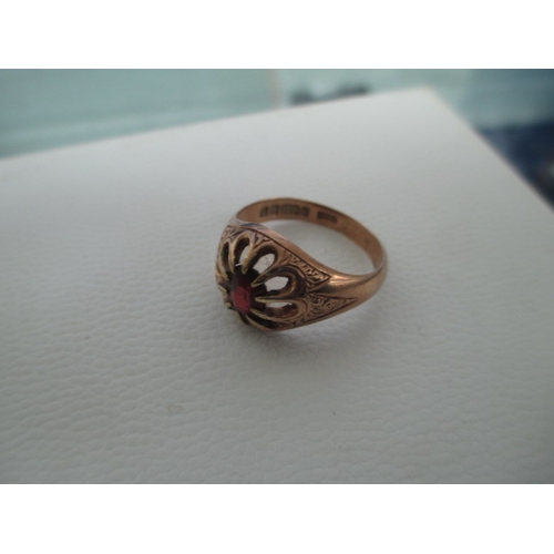 405 - 9ct gold ring with small red stone, weight 5grams