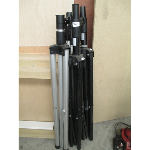 419 - Four tripod stands